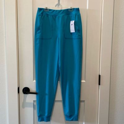 Nike Women’s Bright Spruce Tek Gear Pants.